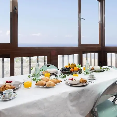 Volcanoes And Ocean Views *